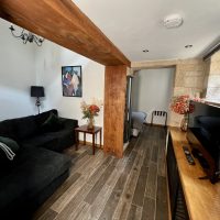 The Living room: Corner sofa and smart tv
